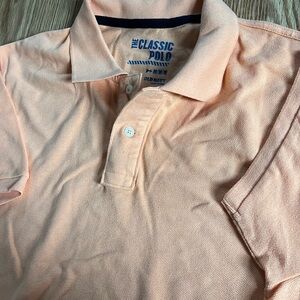 ON classic polo.  NWT. Orange color